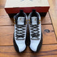 Größe 9.5 – Jordan 12 Retro 'Royalty' (Gebraucht)