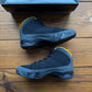 Talla 11.5 - Jordan 9 Retro 'Dark Charcoal University Gold' (Usado)