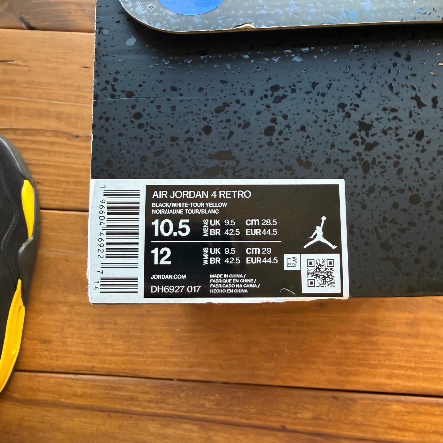 10.5 - Jordan 4 Retro 'Thunder' 2023 (GEBRAUCHT)
