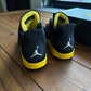 Talla 13 - Jordan 4 Retro 'Thunder' 2023 (Usado)