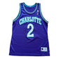 Grande - Camiseta vintage de los Hornets de Larry Johnson de Champion
