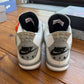 Talla 11 - Jordan 4 Retro OG 'White Cement' 2025 (Usado)