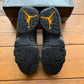 Talla 11.5 - Jordan 9 Retro 'Dark Charcoal University Gold' (Usado)