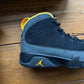 Talla 11.5 - Jordan 9 Retro 'Dark Charcoal University Gold' (Usado)