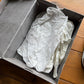 Talla 10 - Jordan 4 Retro 'Cave Stone' (Usado)